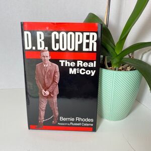 D.B.Cooper MINT New Hardback Signatures X 2